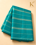 Premium Chiniya Georgette Pattu Saree – Peacock Blue Silver Zari Stripe Weaving with Matching Blouse